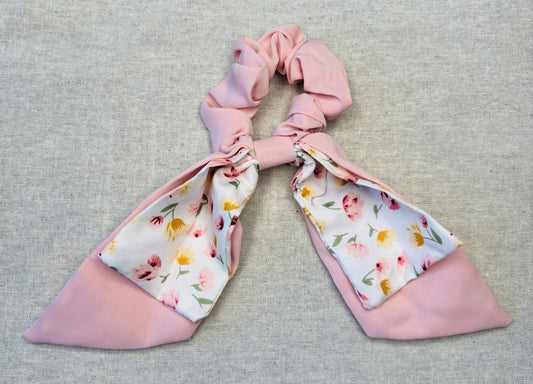 Scrunchie with playful bow, pastel colors and floral print