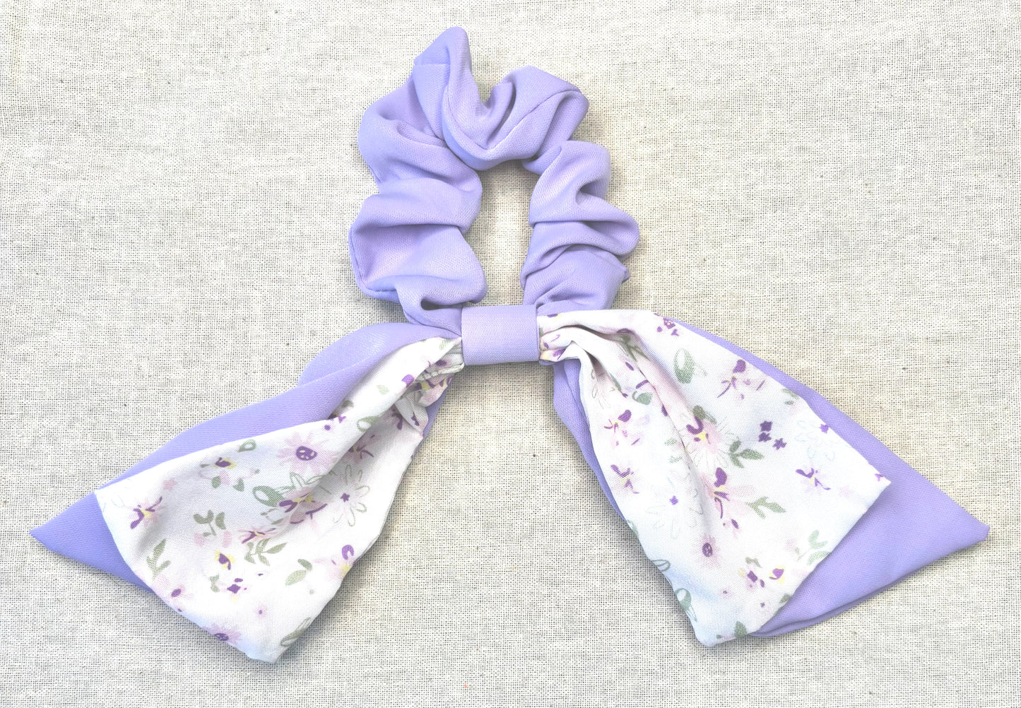 Scrunchie with playful bow, pastel colors and floral print